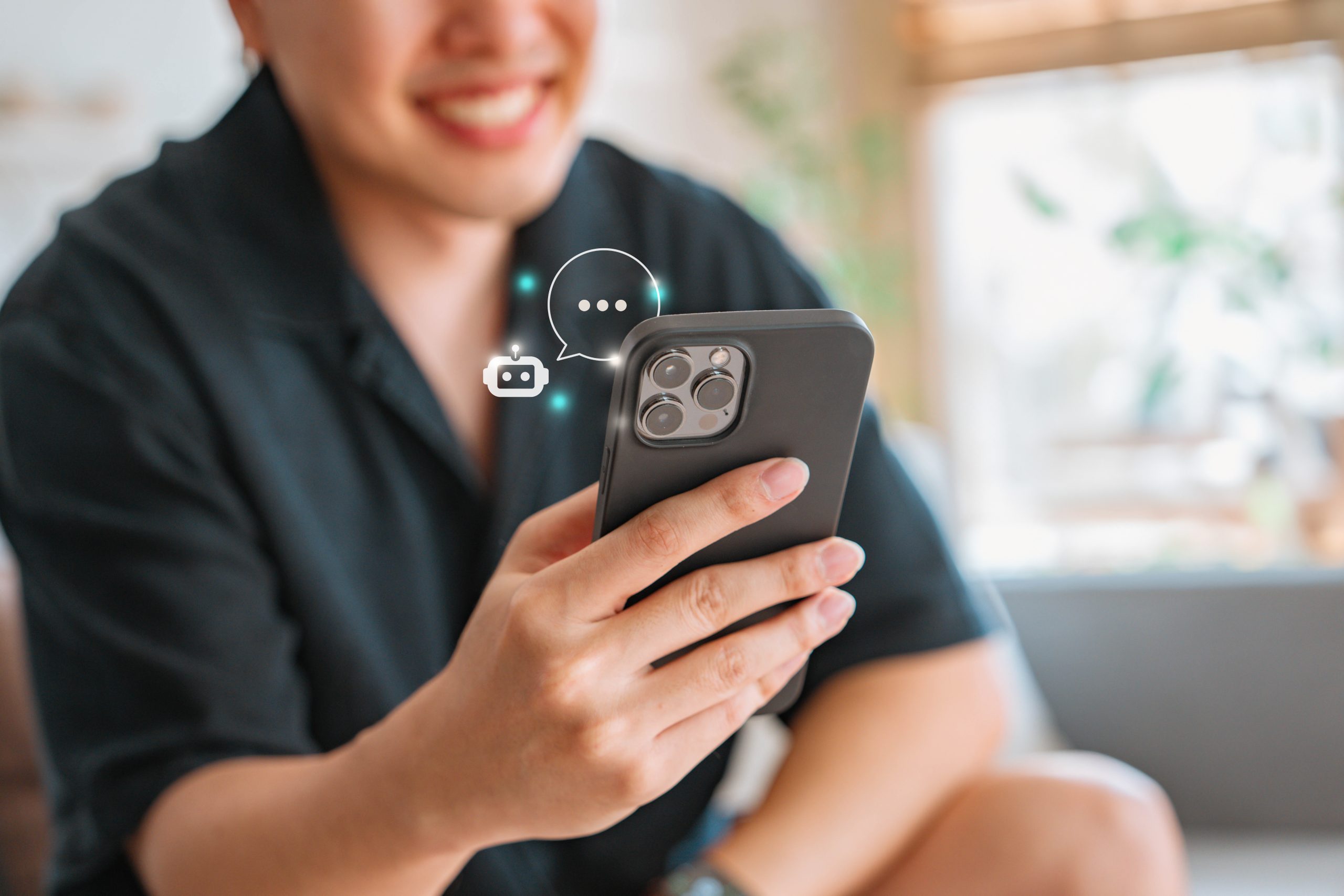 Digital AI chatbot, Happy man using mobile smartphone with AI chatbot for online information at home, conversation assistant.
